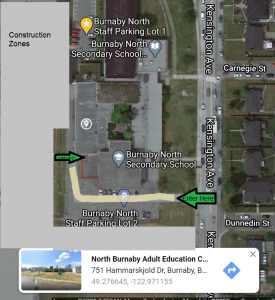 Access the NBAEC from the South driveway between the construction zone and the school building on Kensington